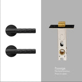 A pair of Black diamond knurled door handles